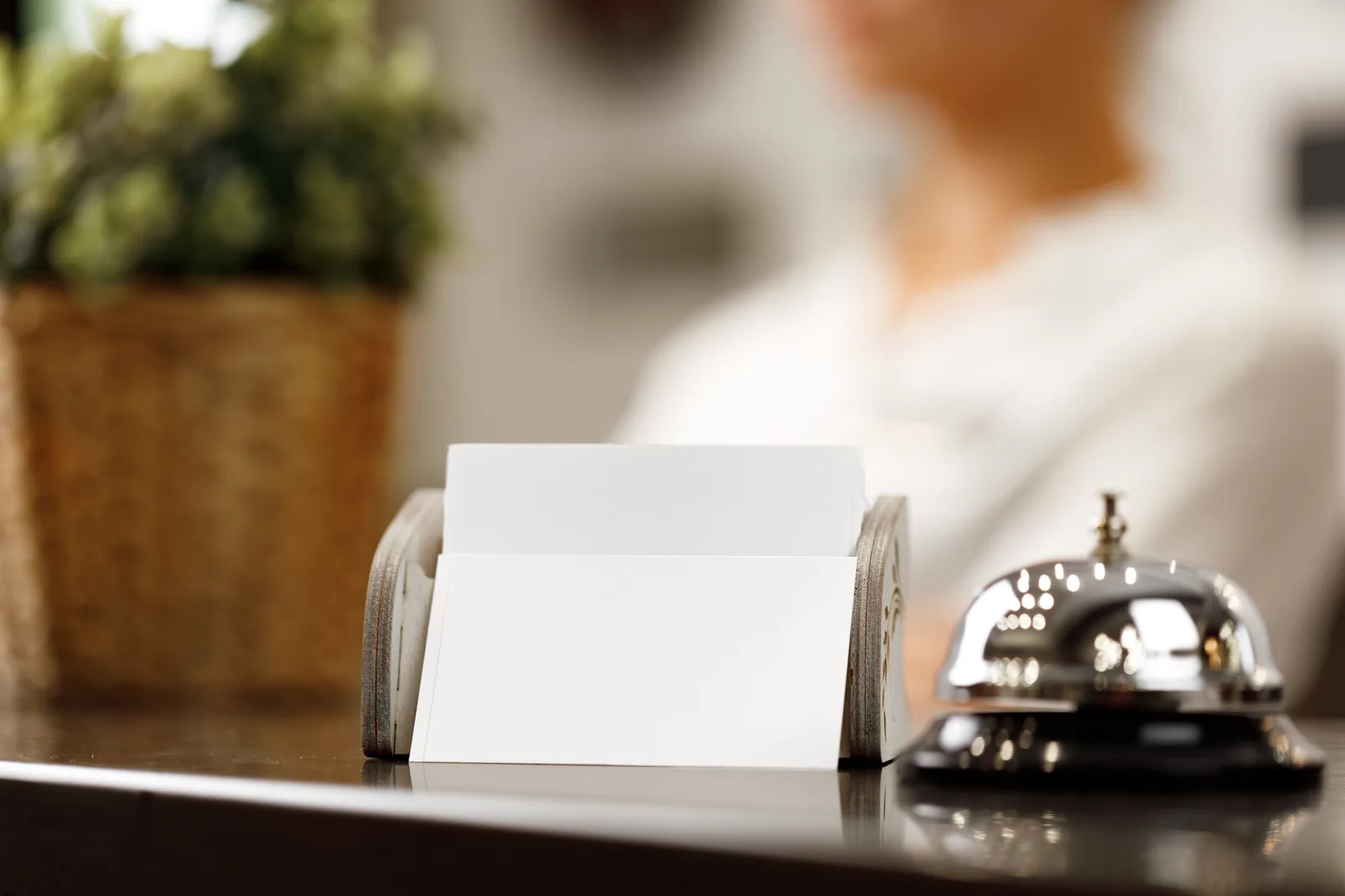 Hotel reception desk with a service bell